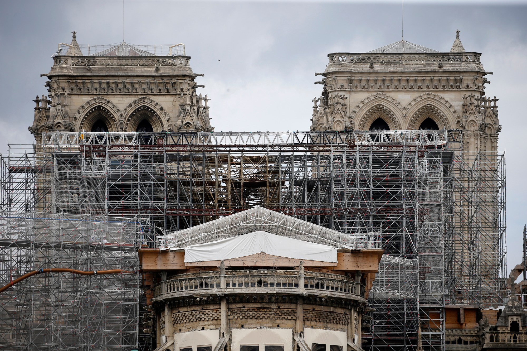PARIS, FRANCE - JULY 10: Notre-Dame Cathedral is seen during the dismantling operations of the scaffolding on July 10, 2020 in Paris, France. Fifteen months after the fire ravaged the famous monument and moved the whole world, French President Emmanuel Macron finally decided to reconstruct the cathedral of Paris identically. (Photo Chesnot/Getty Images)