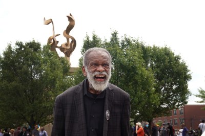 CHICAGO, ILLINOIS - JUNE 30: Artist Richard Hunt attends the dedication of his monument (rear) to journalist, educator, and civil rights leader, Ida B. Wells on June 30, 2021 in Chicago, Illinois. The monument stands where the Ida B. Wells public housing complex once stood in the Bronzeville neighborhood.  (Photo by Scott Olson/Getty Images)