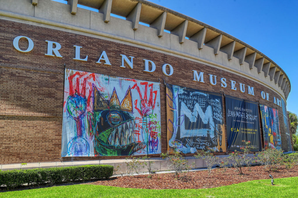 Signs for the Jean-Michel Basquiat exhibit outside the Orlando Museum of Art in Orlando, Florida, on March 25, 2022. (Orlando Sentinel/Tribune News Service via Getty Images)