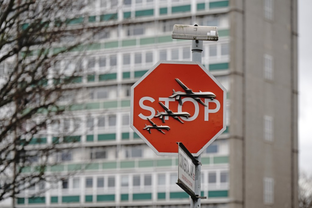 Banksy has unveiled a new piece of art work at the intersection of Southampton Way and Commercial Way in Peckham, south east London, which shows three planes perched on a stop sign. Picture date: Friday December 22, 2023. (Photo by Aaron Chown/PA Images via Getty Images)