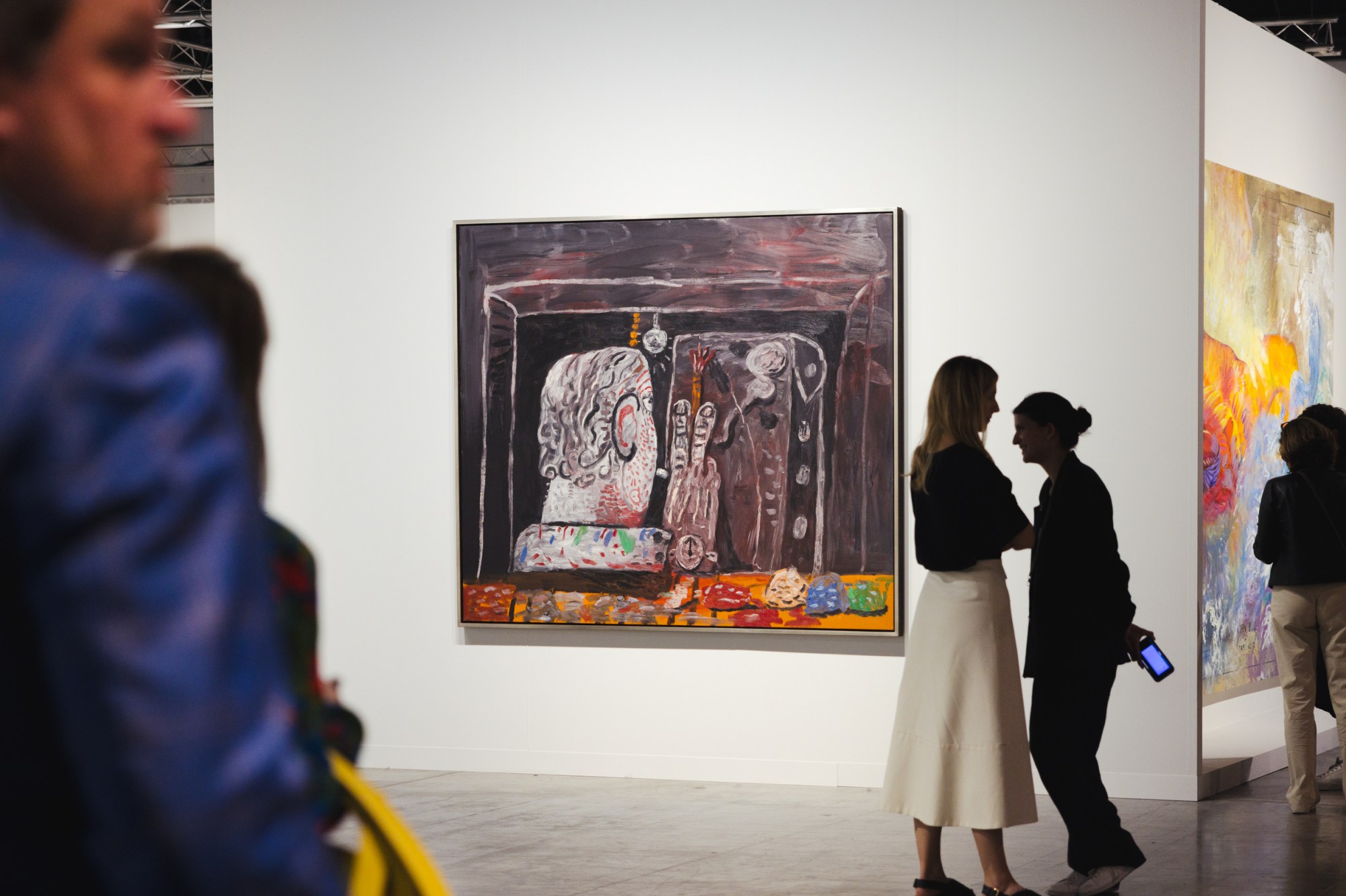 A wide photograph of Philip Guston's painting Painter at Night at the Hauser & Wirth booth at the Art Basel Miami Beach art fair in December, 2023.